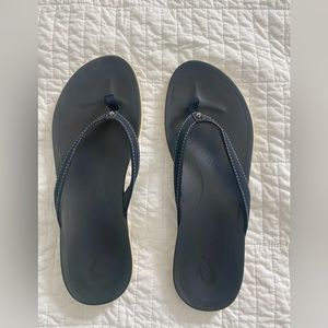 Olukai navy flip flops